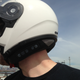 Illustration for article titled What's Better? A $1,200 Motorcycle Helmet or Cheap Earbuds?
